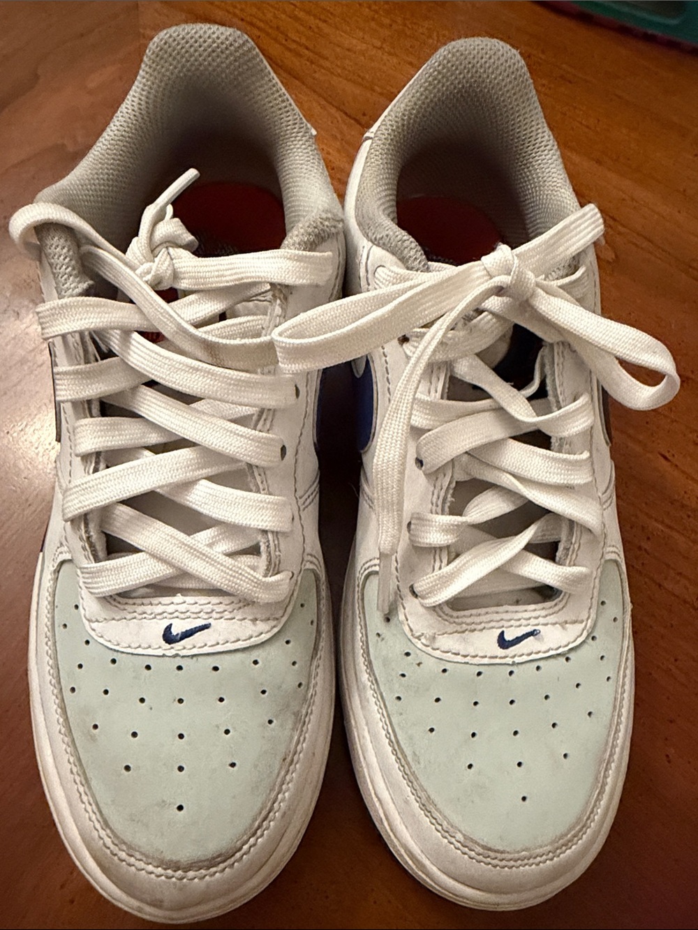 Nike White Sneakers with Pale Blue Suede Toe and Navy Swoosh